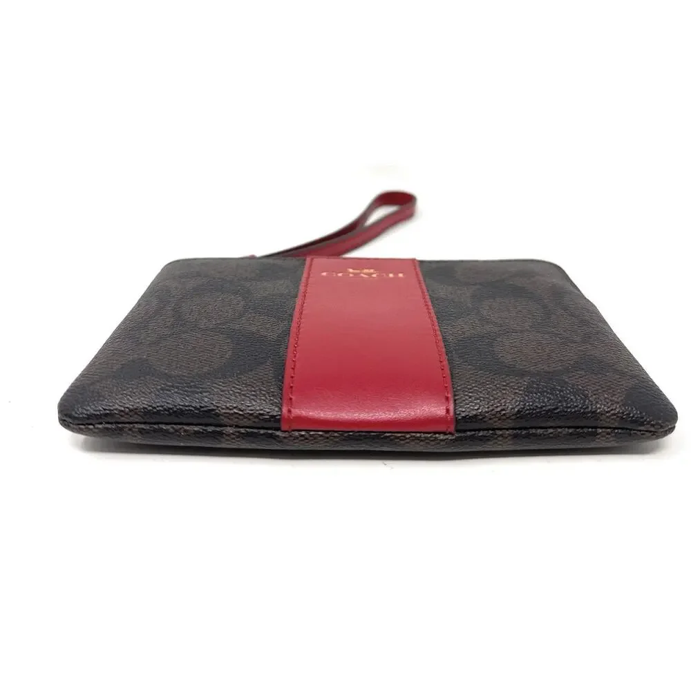 Coach Corner Zip Wristlet In Signature Canvas Brown Red